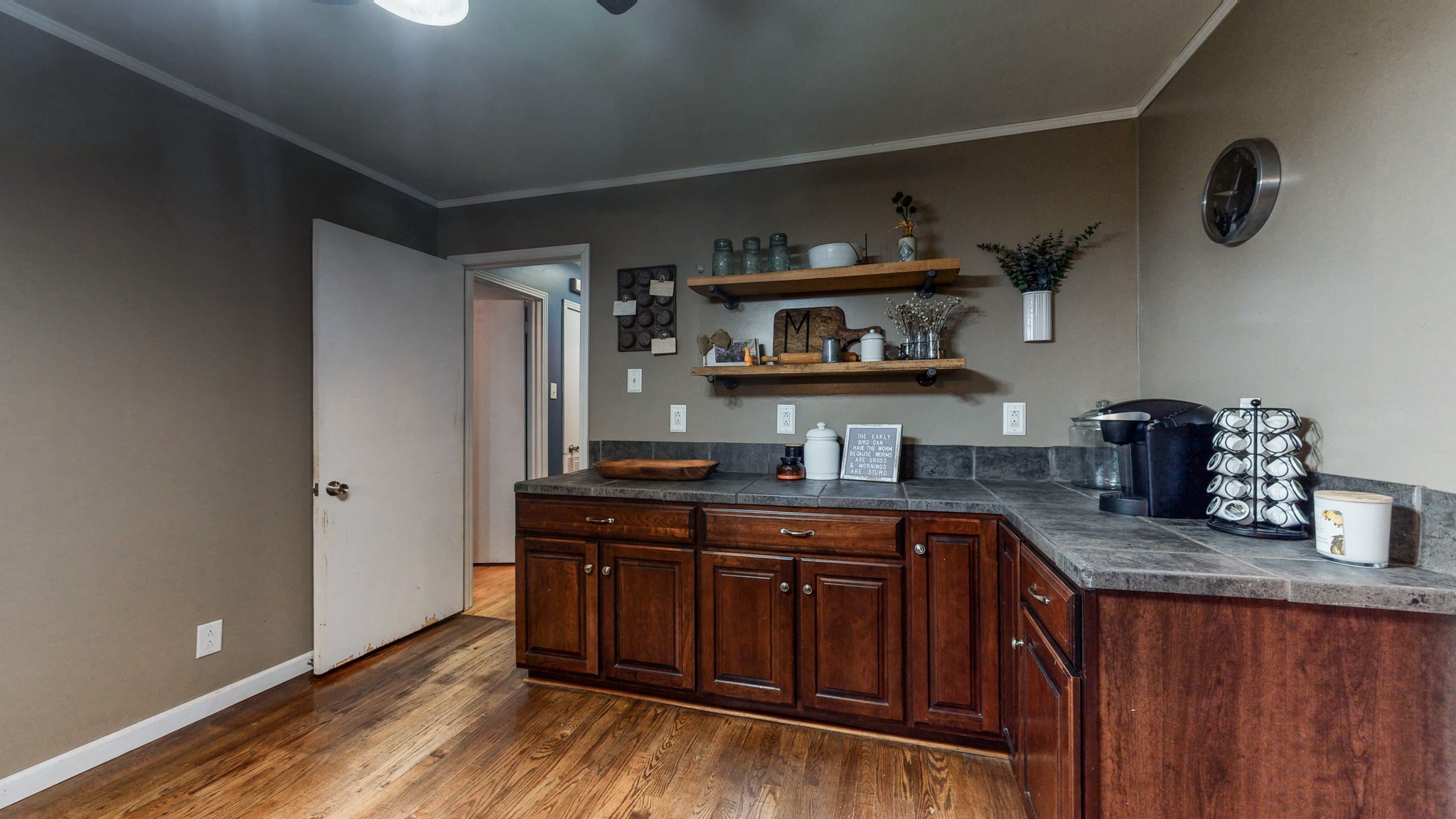 2101 Pea Ridge Road Clarksville, TN 37040 - Photo 11 of 59 a kitchen with stainless steel appliances granite countertop a sink and wooden cabinets