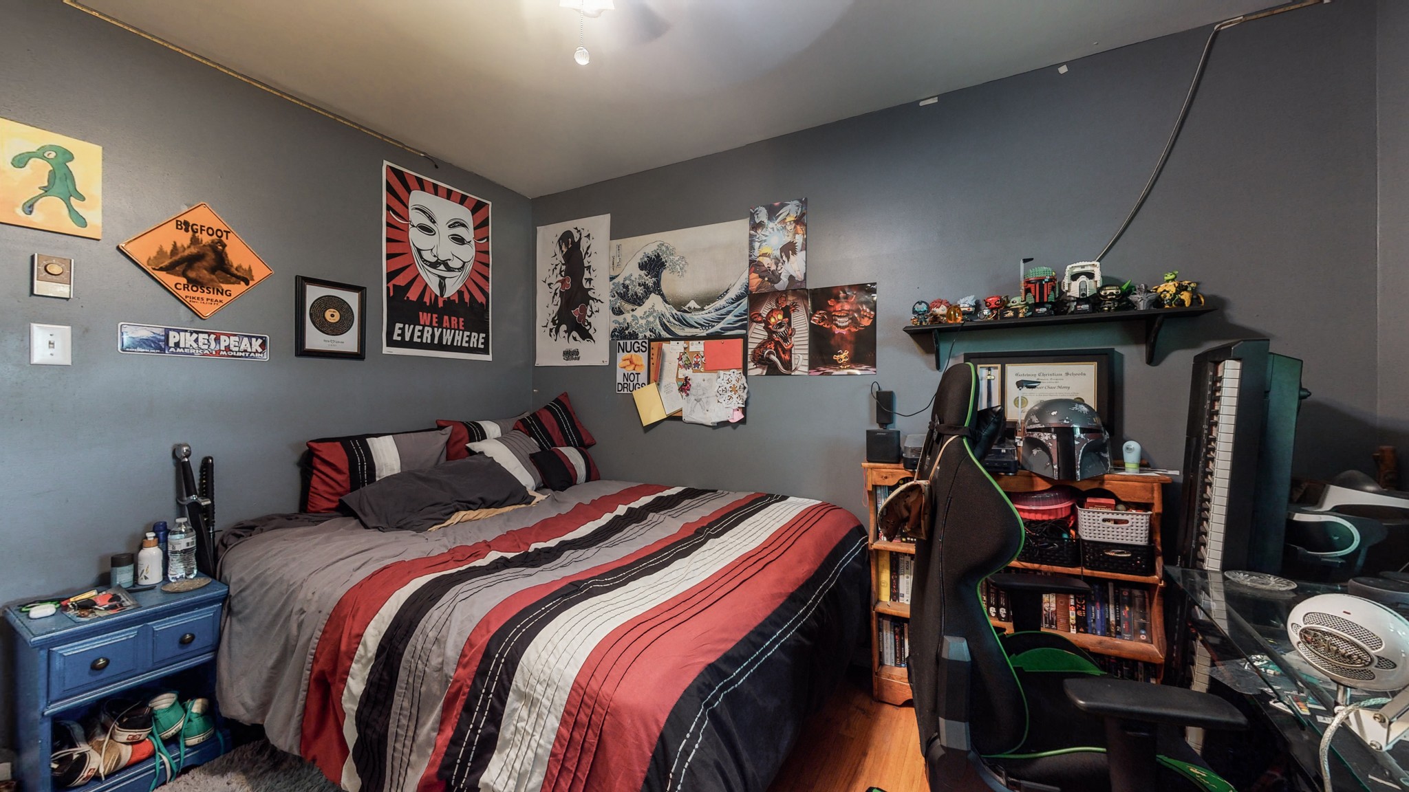 2101 Pea Ridge Road Clarksville, TN 37040 - Photo 19 of 59 a bedroom with bed and paintings on the wall