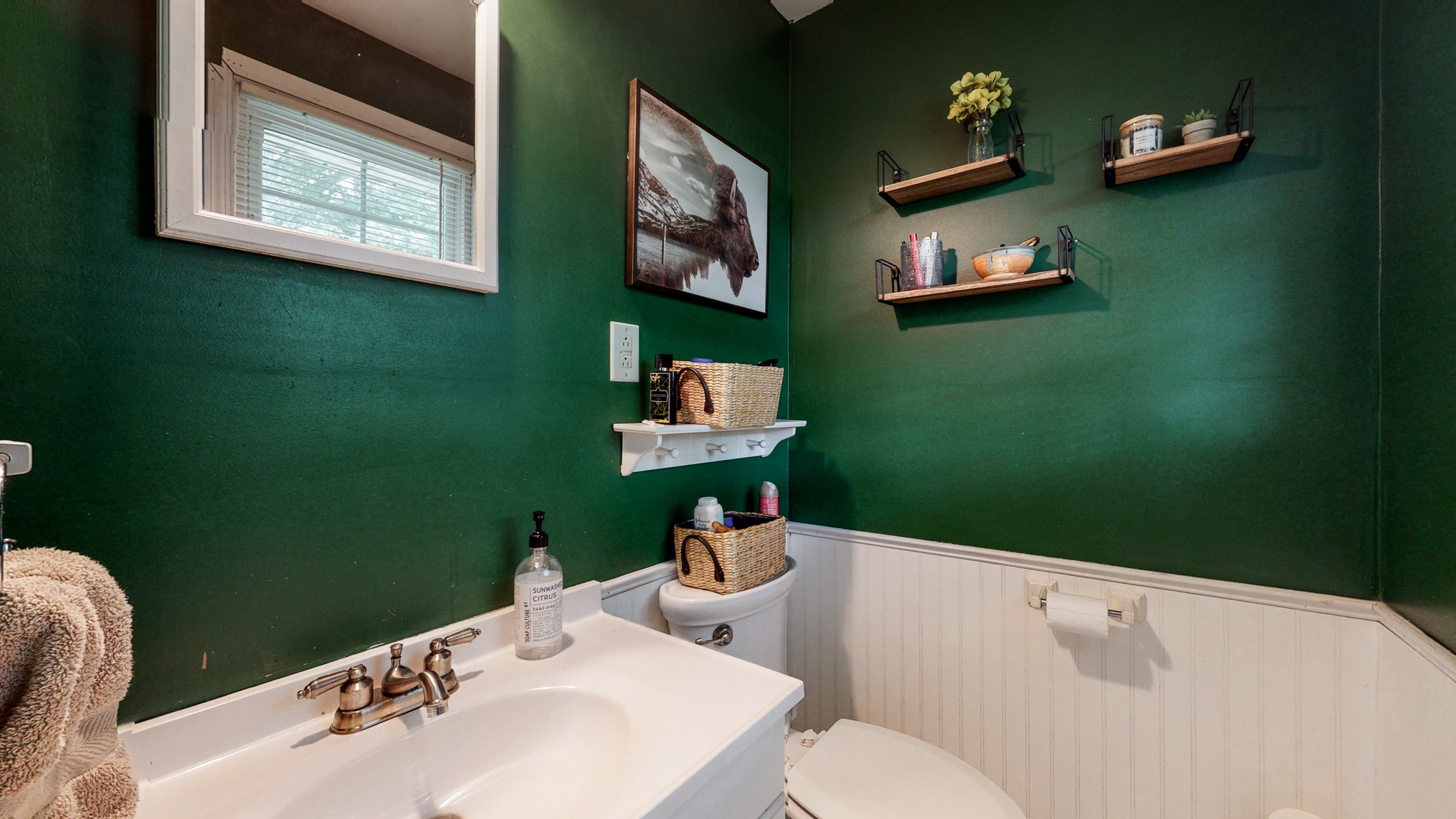 2101 Pea Ridge Road Clarksville, TN 37040 - Photo 28 of 59 a bathroom with a toilet sink and mirror