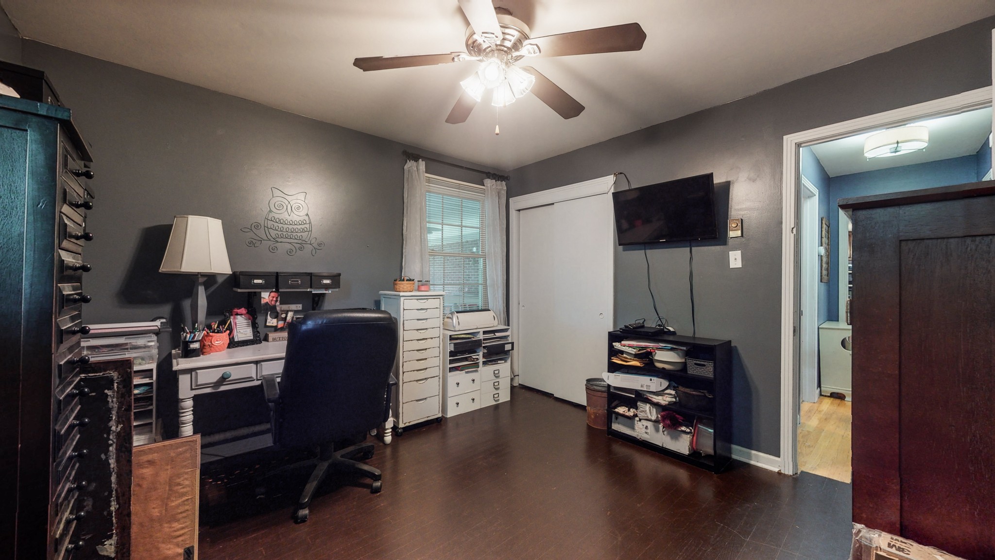 2101 Pea Ridge Road Clarksville, TN 37040 - Photo 31 of 59 a view of a workspace with furniture and a ceiling fan