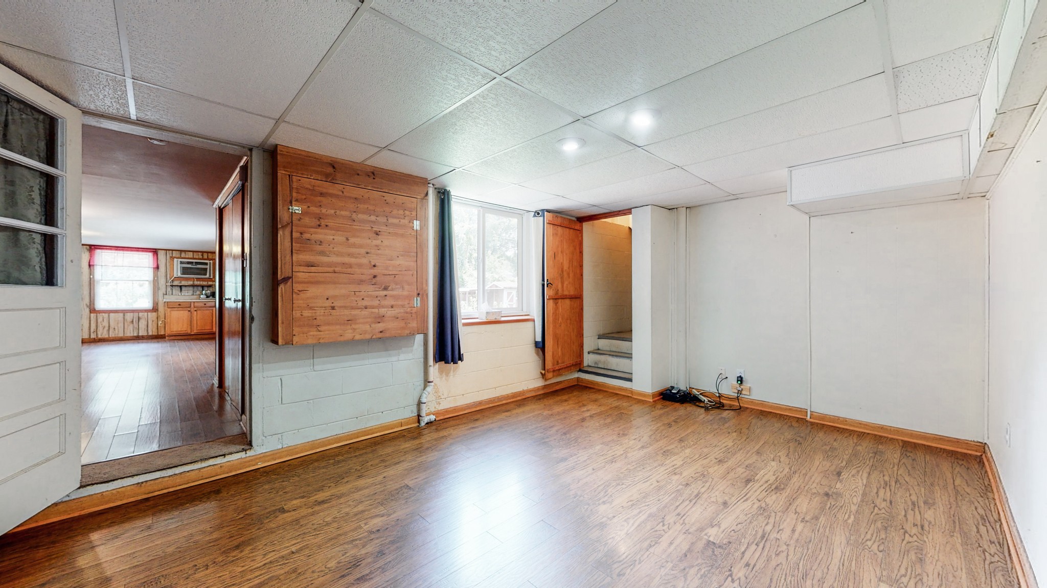 2101 Pea Ridge Road Clarksville, TN 37040 - Photo 34 of 59 a view of an empty room with window and wooden floor