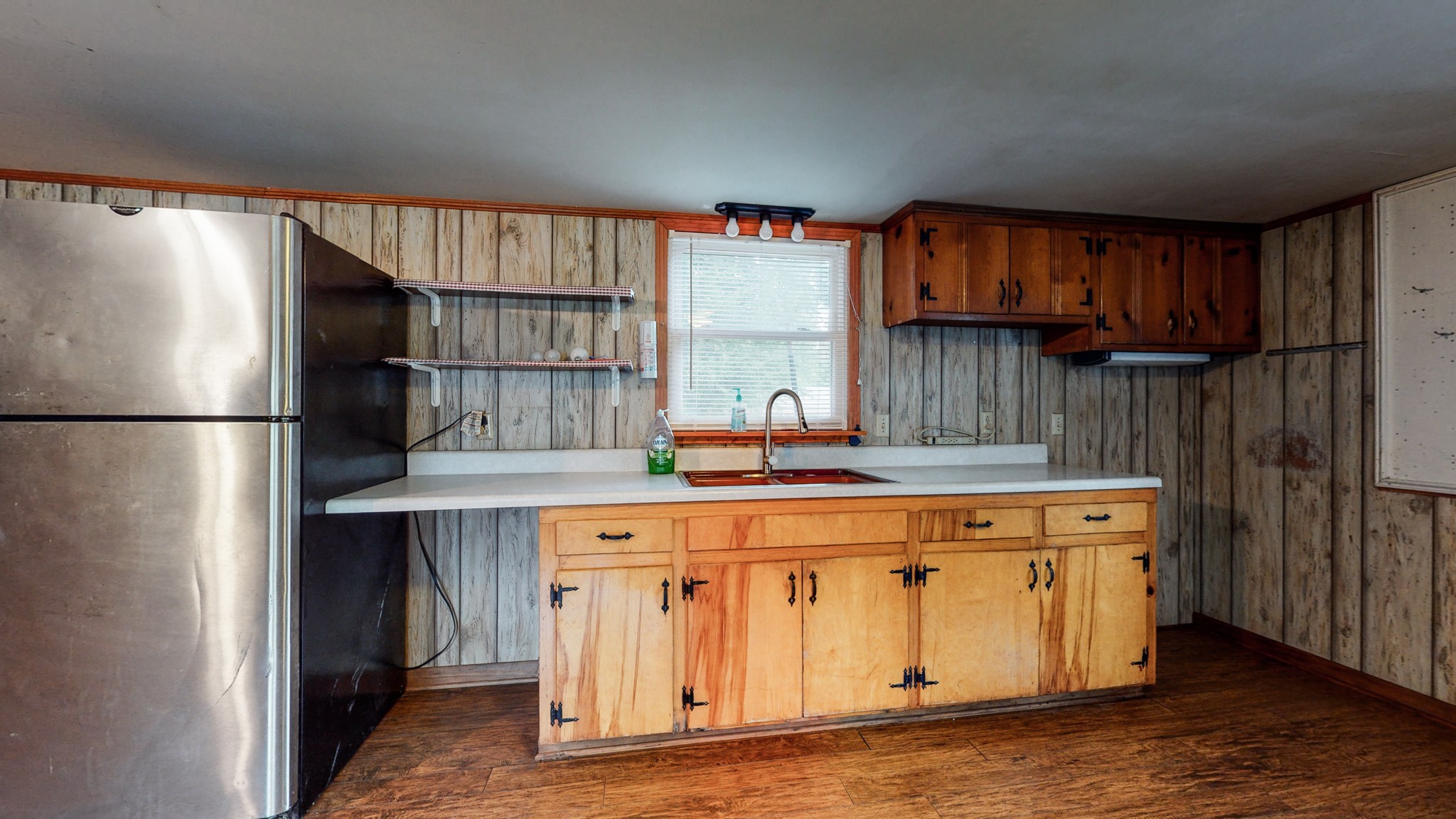 2101 Pea Ridge Road Clarksville, TN 37040 - Photo 43 of 59 a kitchen with a stove and a refrigerator