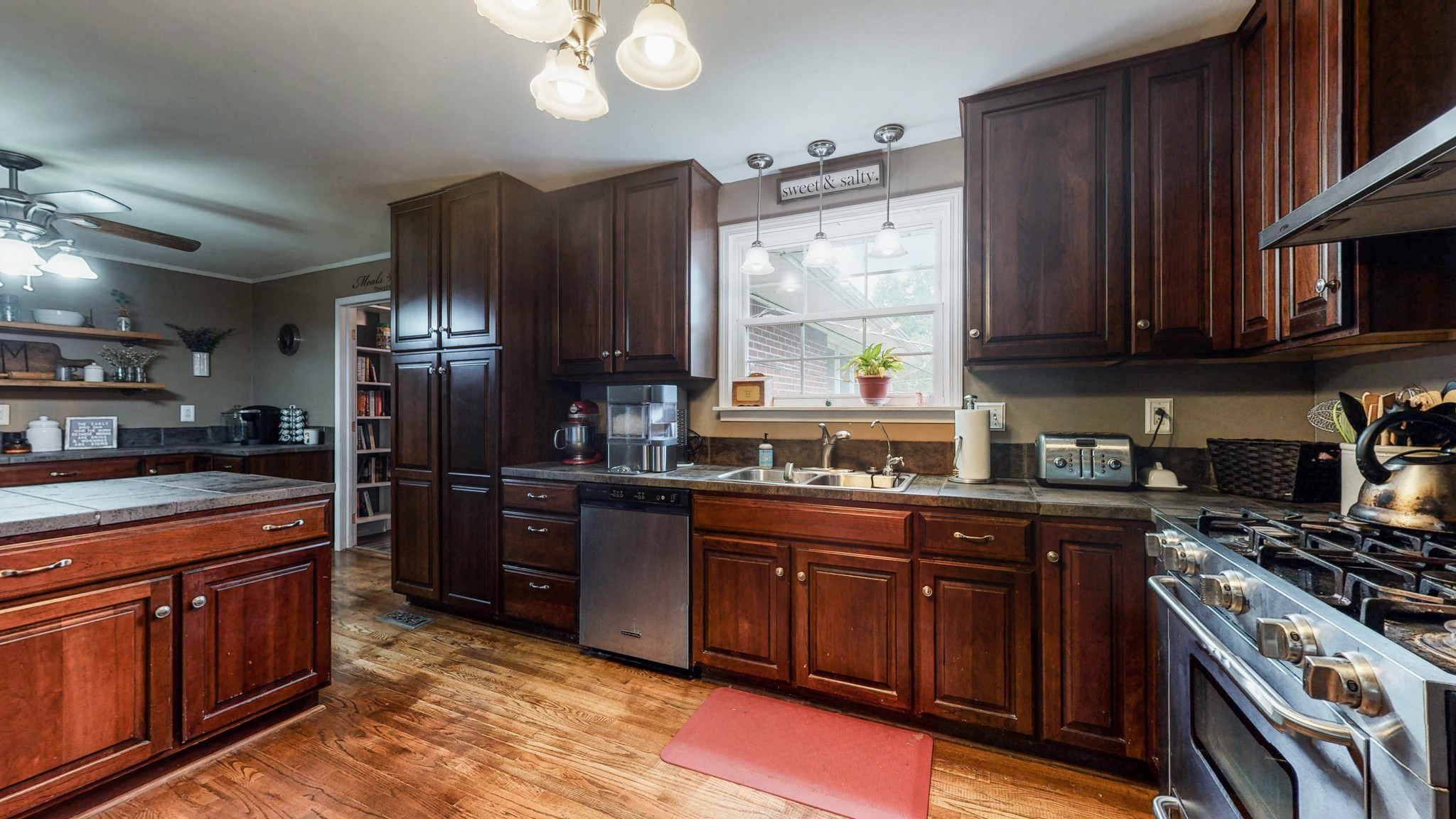 2101 Pea Ridge Road Clarksville, TN 37040 - Photo 9 of 59 a kitchen with stainless steel appliances granite countertop a stove refrigerator sink and dishwasher