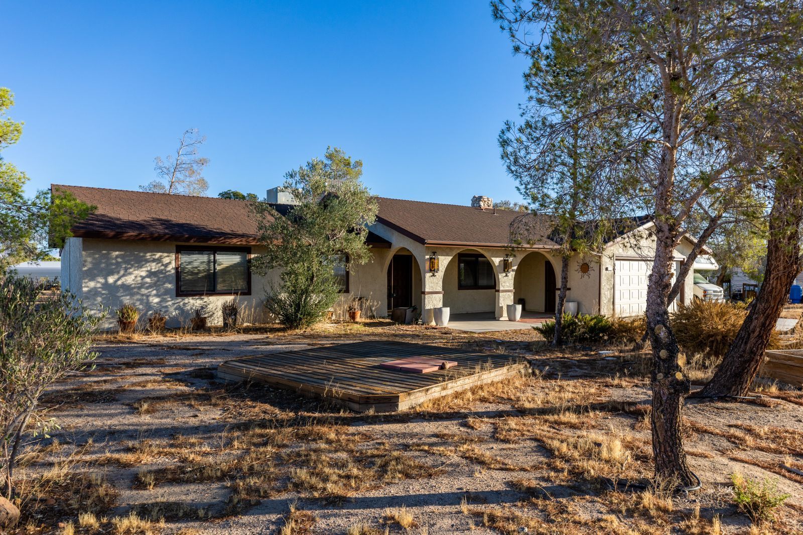 361 North Wildflower Street Ridgecrest, CA 93555 - Photo 2 of 39 a front view of a house with garden