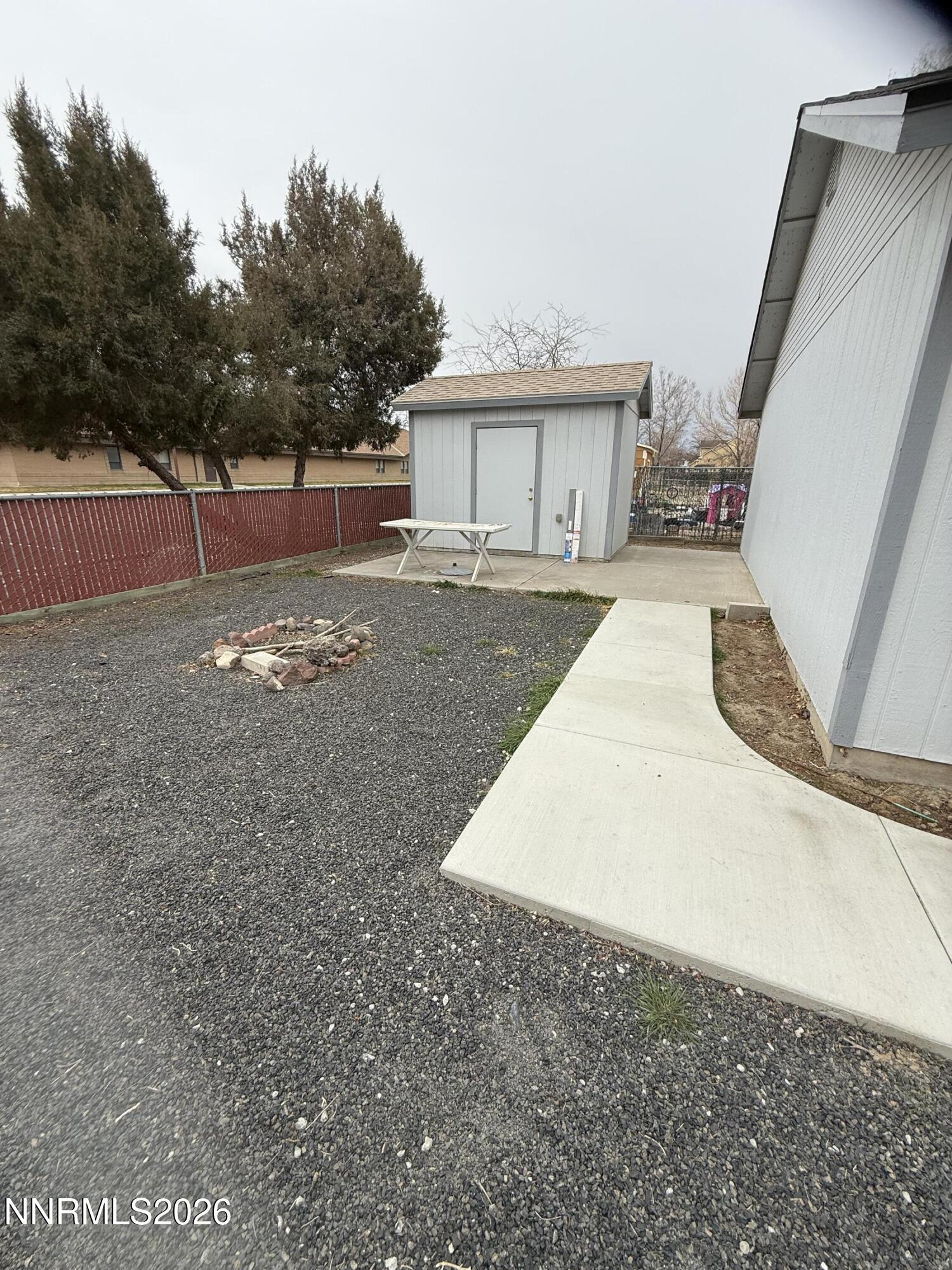 285 Amanda Lane Fallon, NV 89406 - Photo 14 of 15 a view of a house with backyard and a trees
