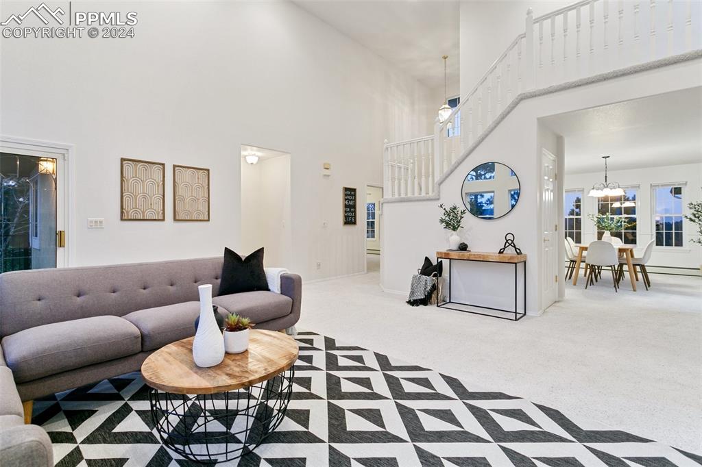 12595 Mc Cune Road Elbert, CO 80106 - Photo 10 of 50 a living room with furniture and a rug