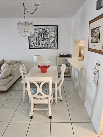 a bathroom with a shower and a mirror