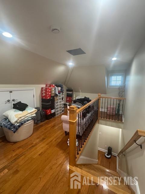 354 Cliff Road, Unit 2 Sewaren, NJ 07077 - Photo 11 of 11 a room with lots of white furniture and a chandelier