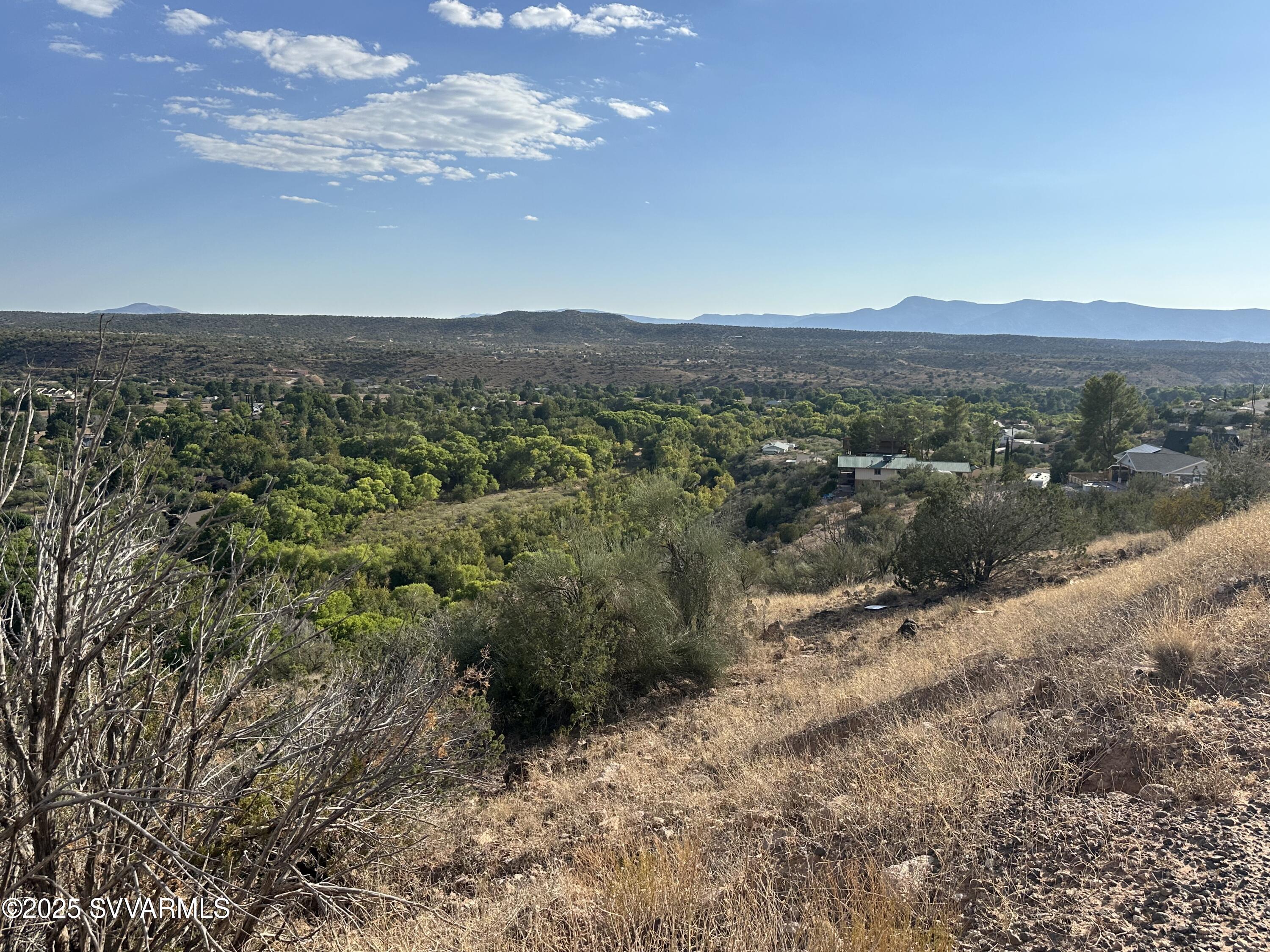 4750 Thunderhead Trail, Unit 227 Rimrock, AZ 86335 - Photo 14 of 23 a view of a forest with mountains in the background