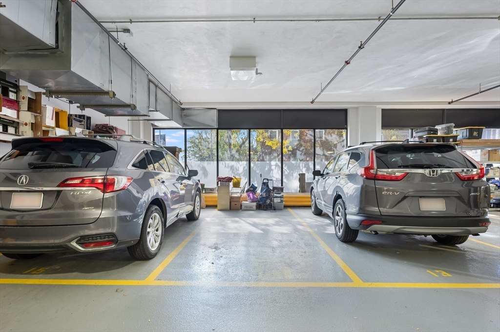 36 A Street, Unit 5D Boston, MA 02127 - Photo 18 of 21 a car parked in garage