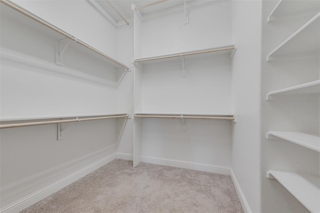 704 Toby Trail Mansfield, TX 76063 - Photo 29 of 40 Spacious closet with light colored carpet