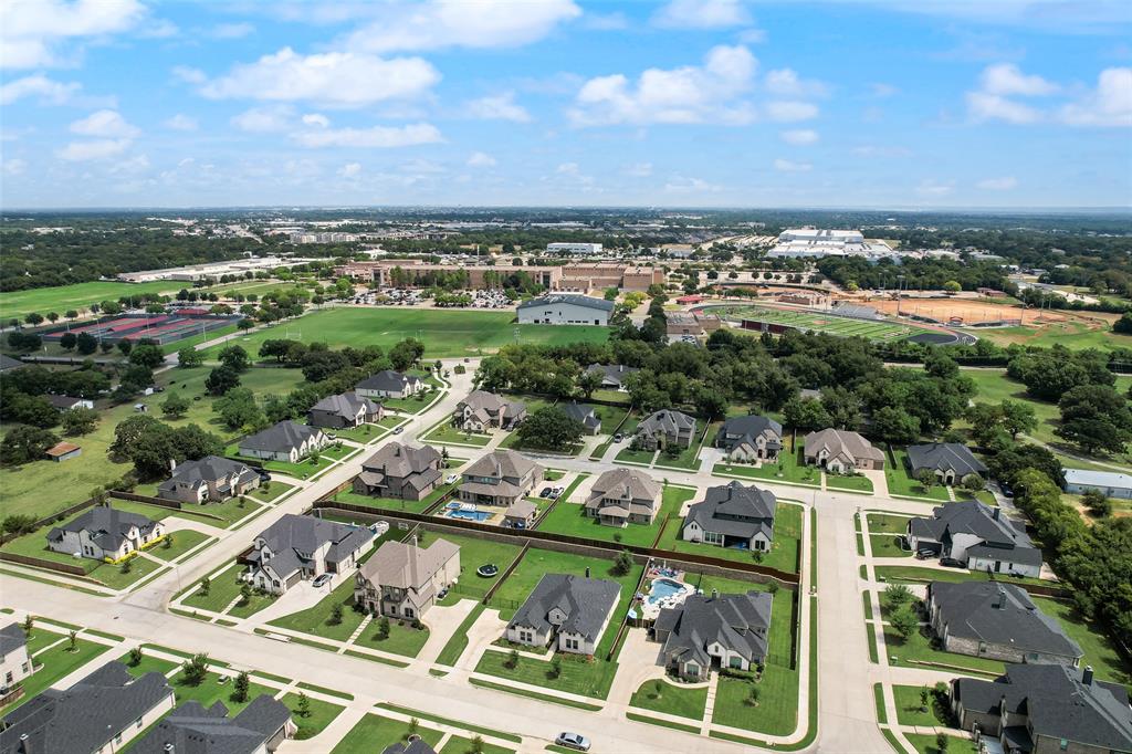 704 Toby Trail Mansfield, TX 76063 - Photo 9 of 40 Aerial overview of property's location with nearby suburban area