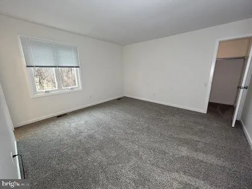 a house view with a backyard space