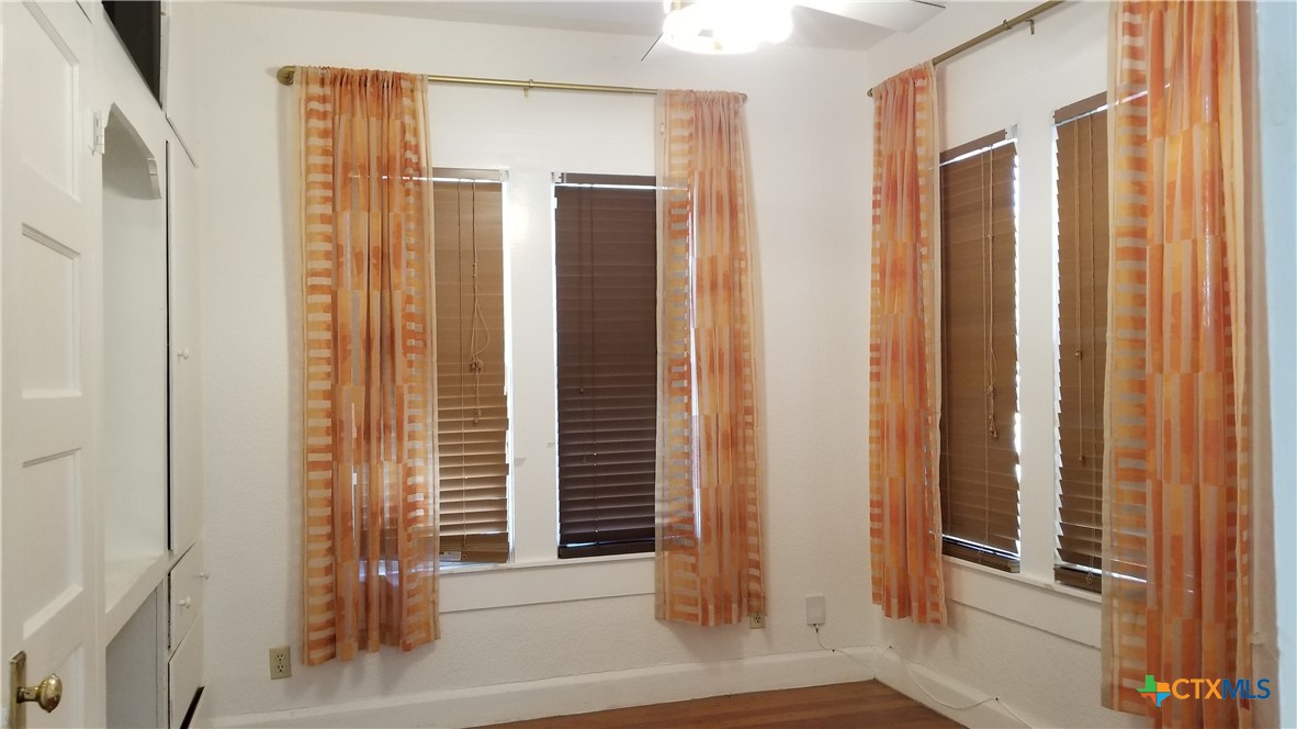 1123 West Coll Street New Braunfels, TX 78130 - Photo 8 of 24 a view of a bathroom with a glass door