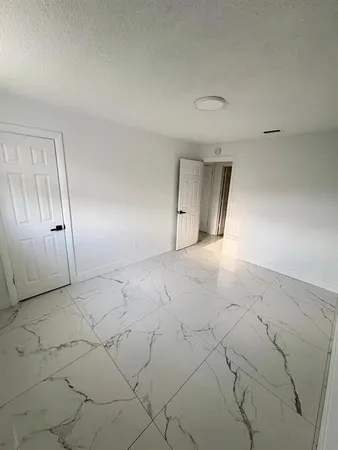 an empty room with a natural light