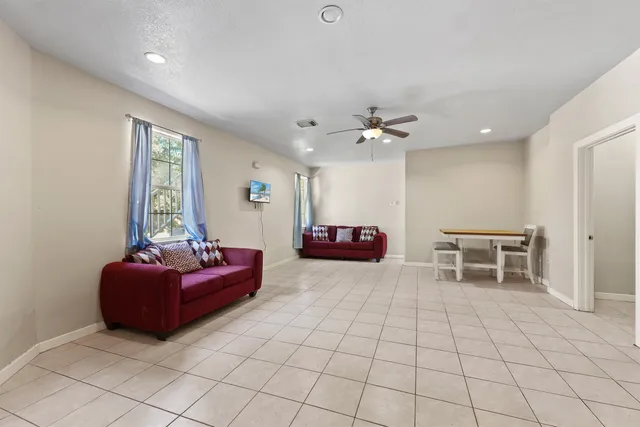 a kitchen with stainless steel appliances granite countertop a stove sink and cabinets