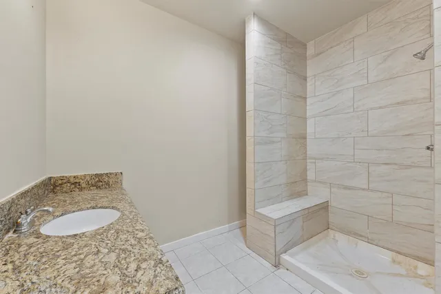 a view of a grassy field with trees