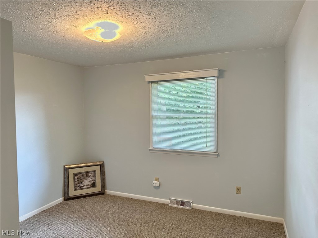 1009 Sandy Lake Road Kent, OH 44240 - Photo 16 of 35 Bedroom 3