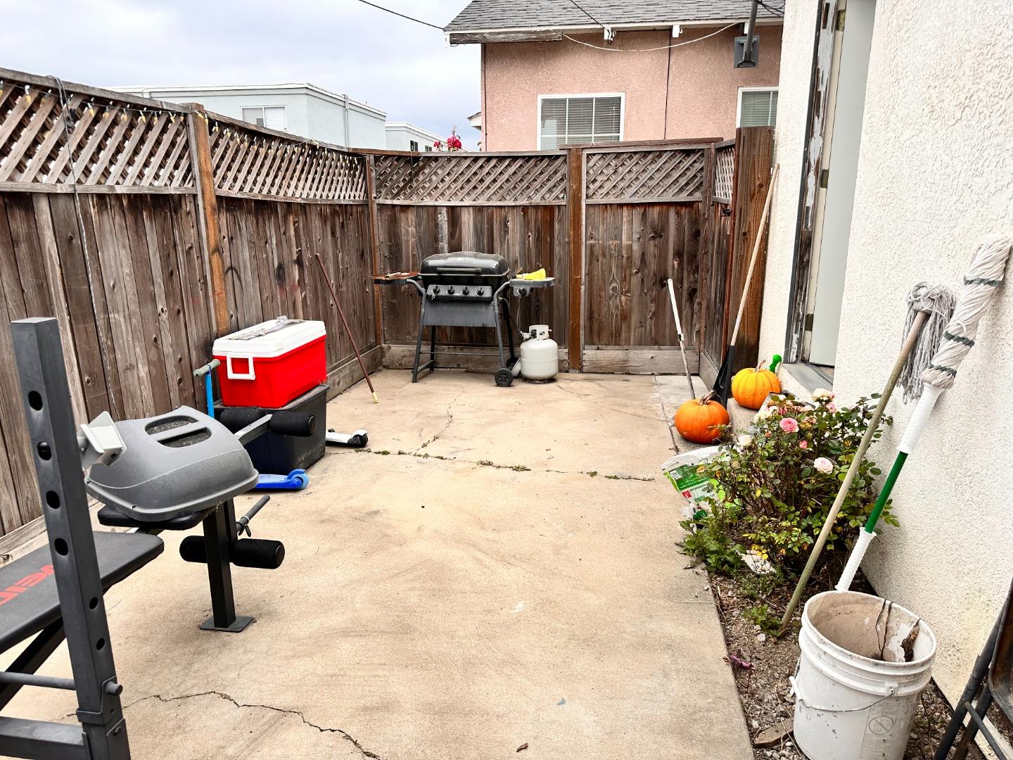 323 Maple Street Salinas, CA 93901 - Photo 14 of 15 a backyard of a house with outdoor seating
