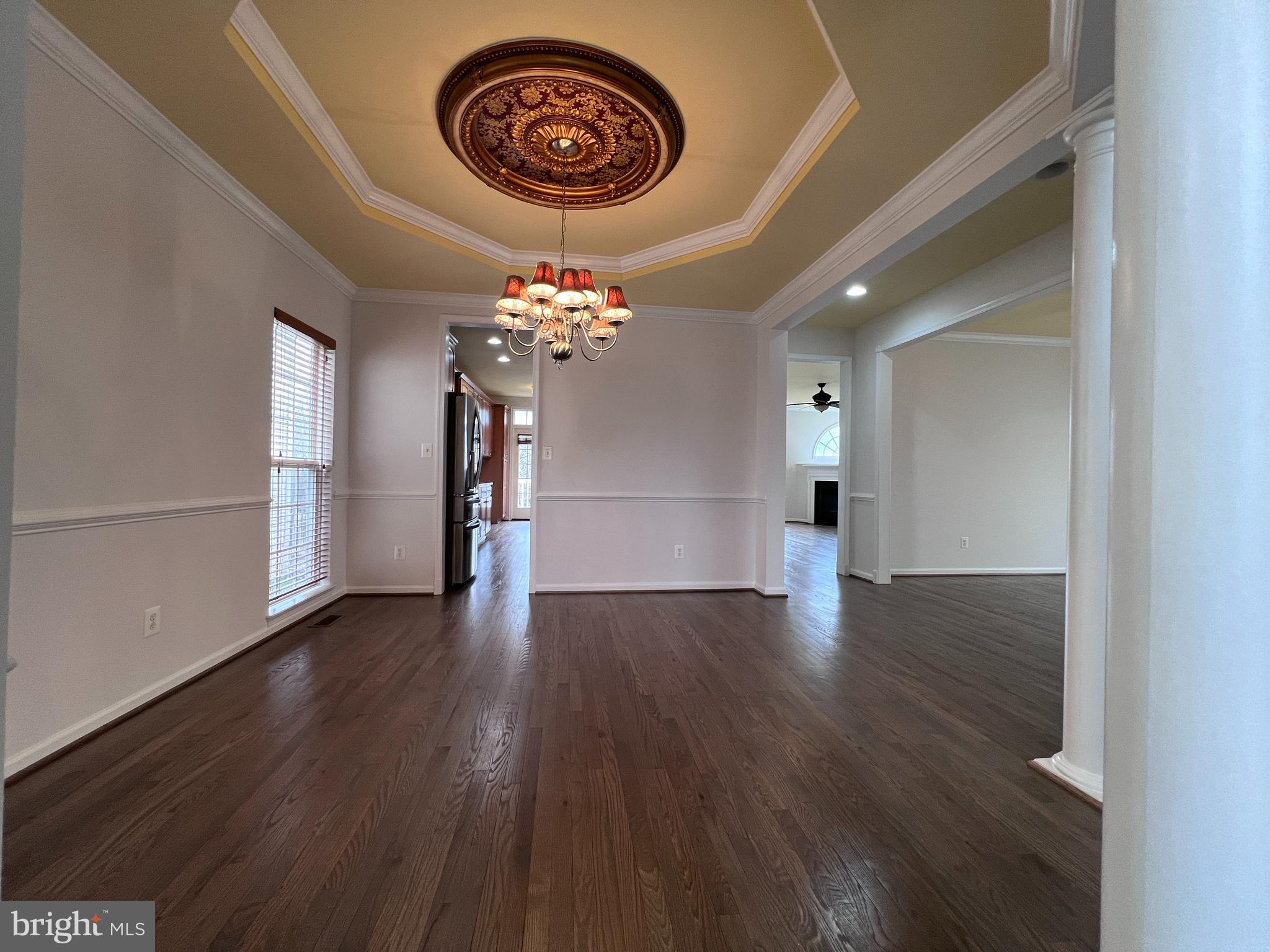 3925 Beeker Mill Place Chantilly, VA 20151 - Photo 11 of 40 wooden floor in an empty room with a window