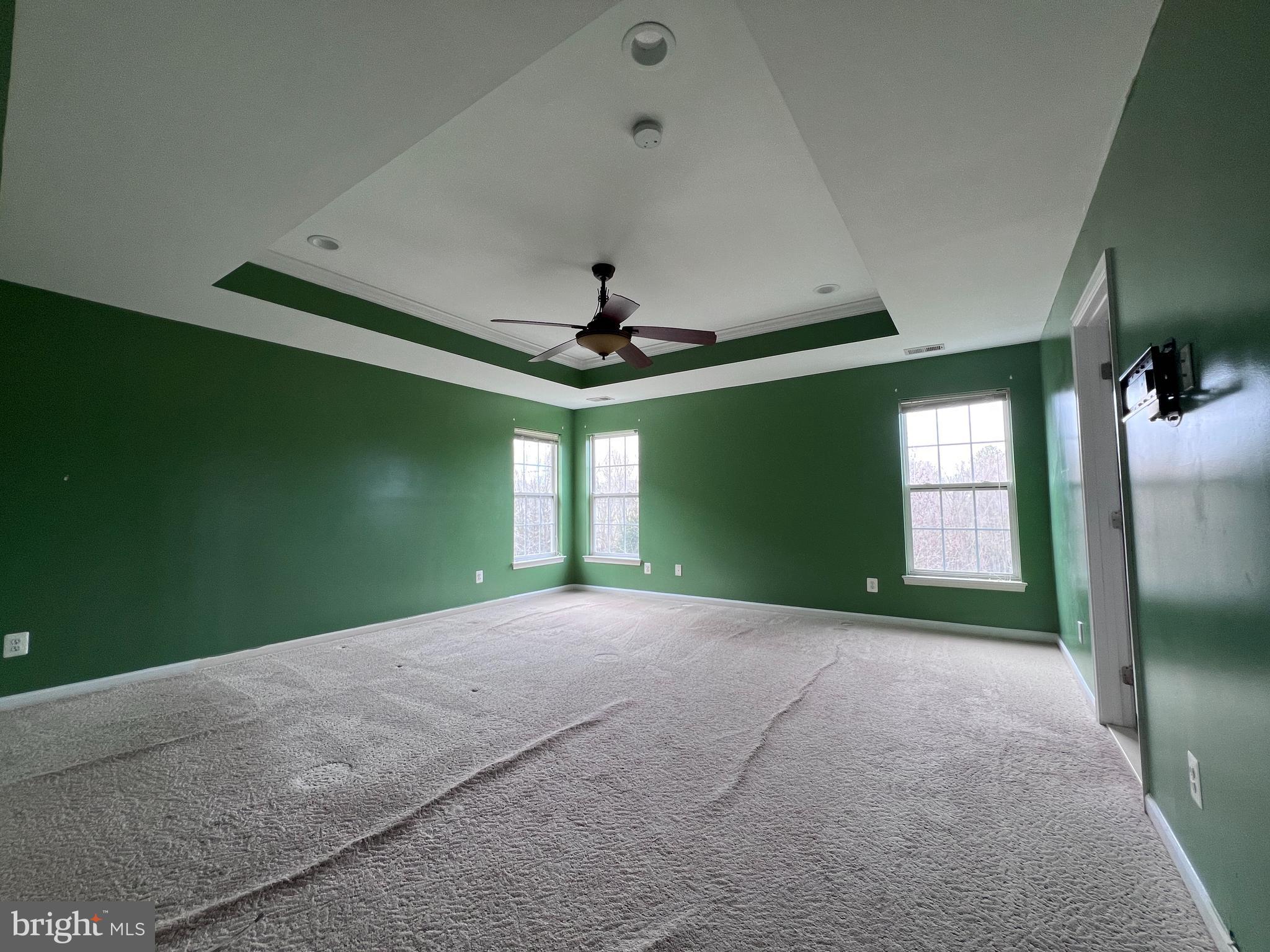 3925 Beeker Mill Place Chantilly, VA 20151 - Photo 16 of 40 a view of empty room with window and ceiling fan