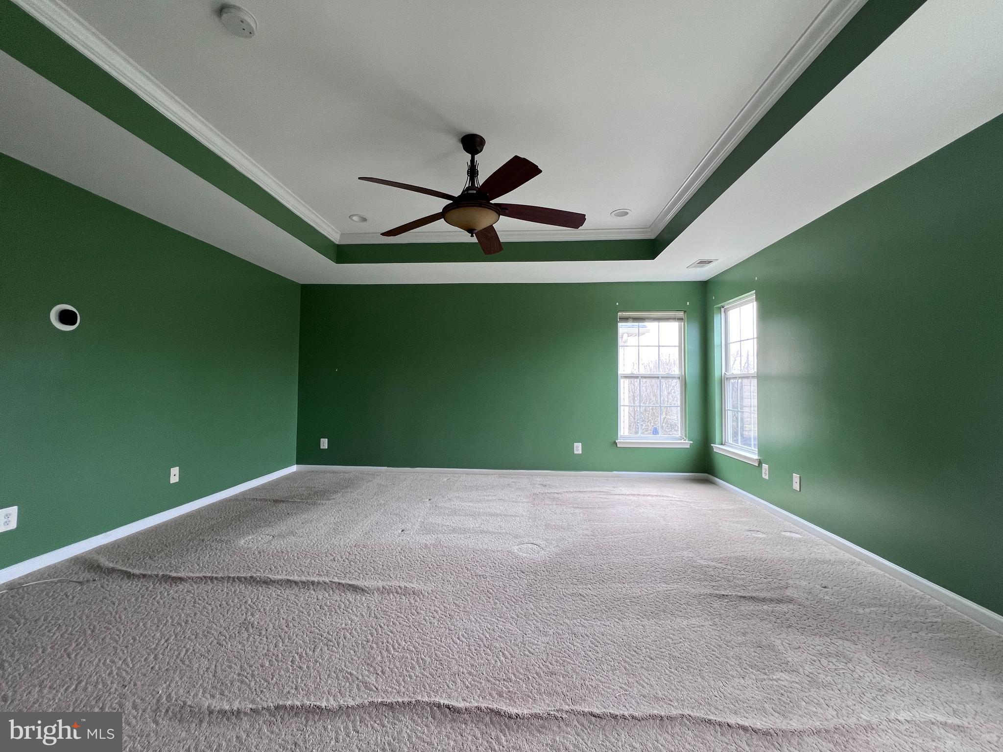 3925 Beeker Mill Place Chantilly, VA 20151 - Photo 18 of 40 a view of a livingroom with a ceiling fan and window