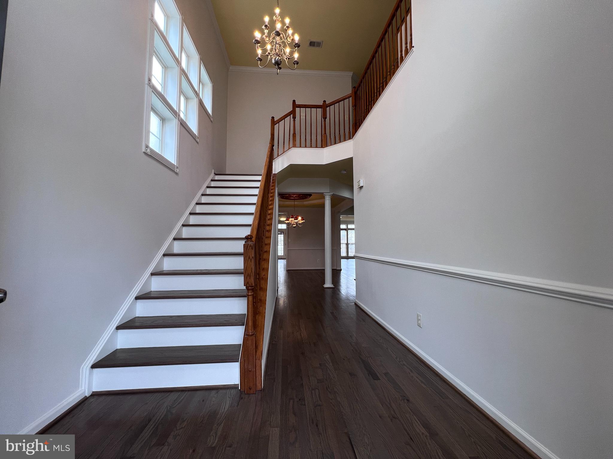 3925 Beeker Mill Place Chantilly, VA 20151 - Photo 2 of 40 a view of entryway and hall with wooden floor