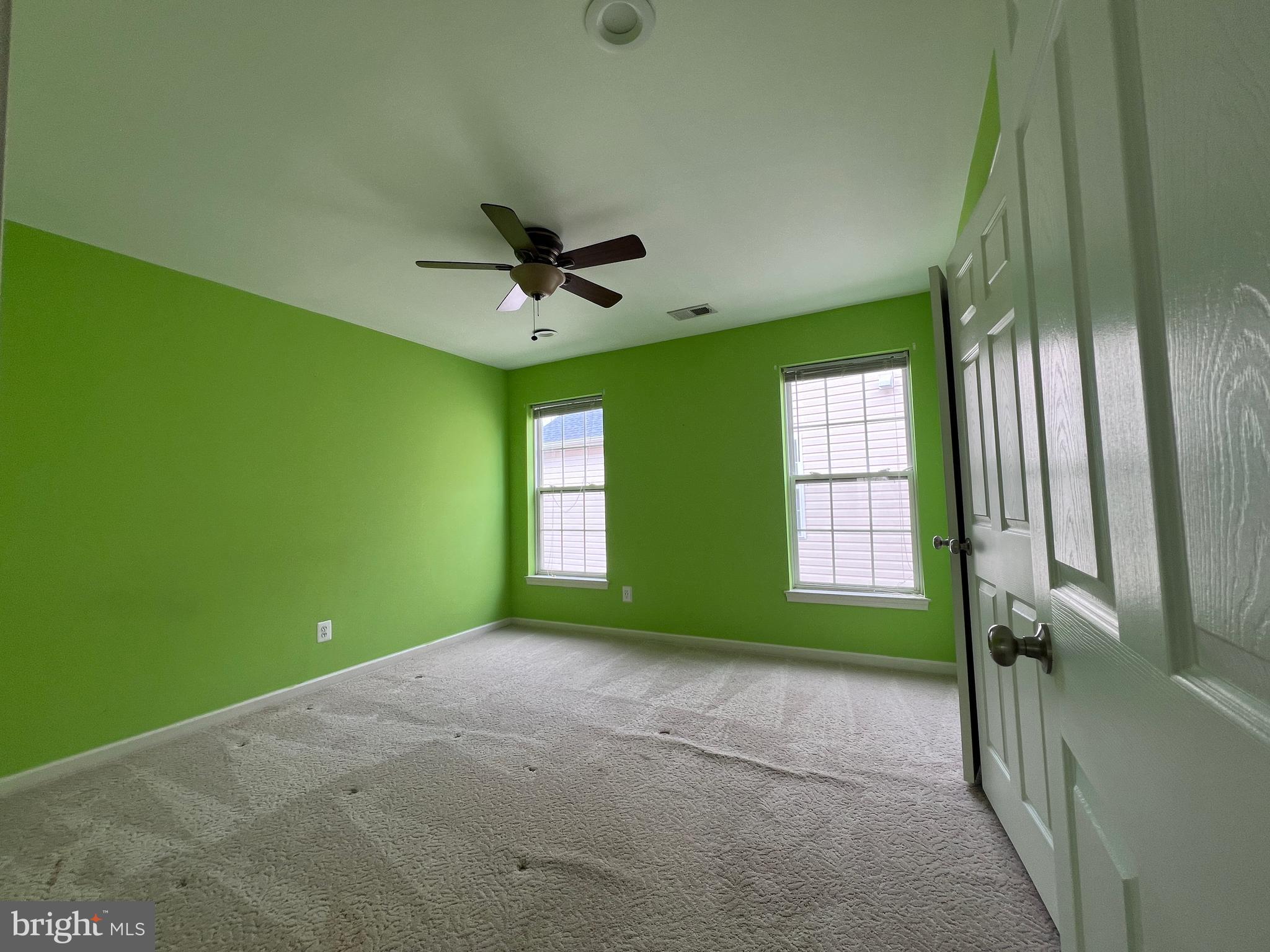 3925 Beeker Mill Place Chantilly, VA 20151 - Photo 28 of 40 a view of empty room with window and ceiling fan