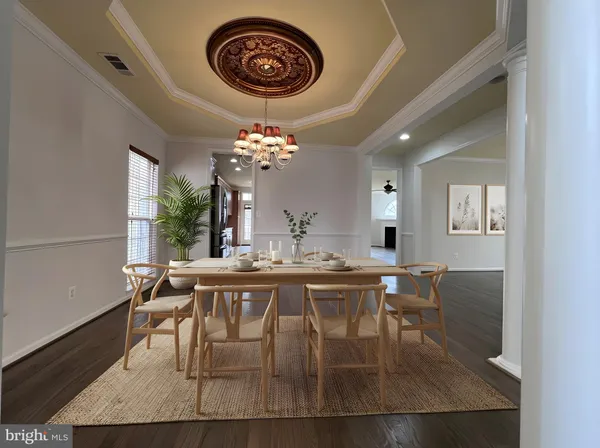 a kitchen with granite countertop a stove and a refrigerator