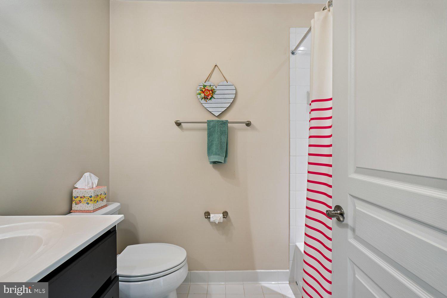 3068 Spring Peeper Court Odenton, MD 21113 - Photo 16 of 42 a bathroom with a toilet and a sink