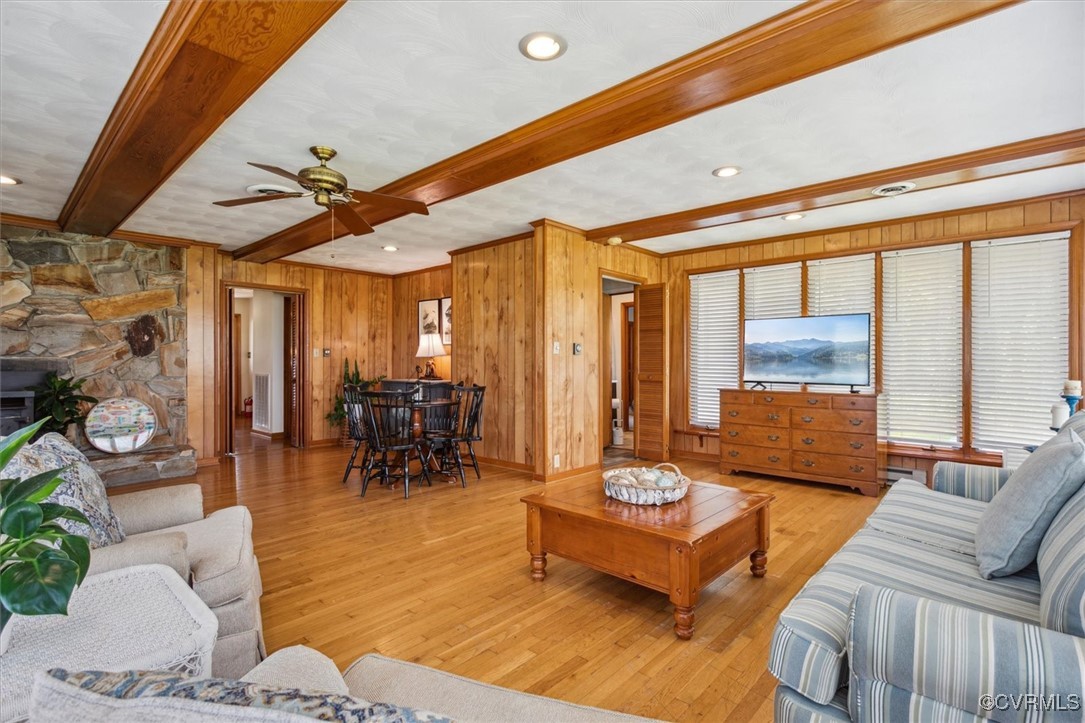 967 Lillys Neck Road Moon, VA 23119 - Photo 20 of 46 a living room with furniture and a large window