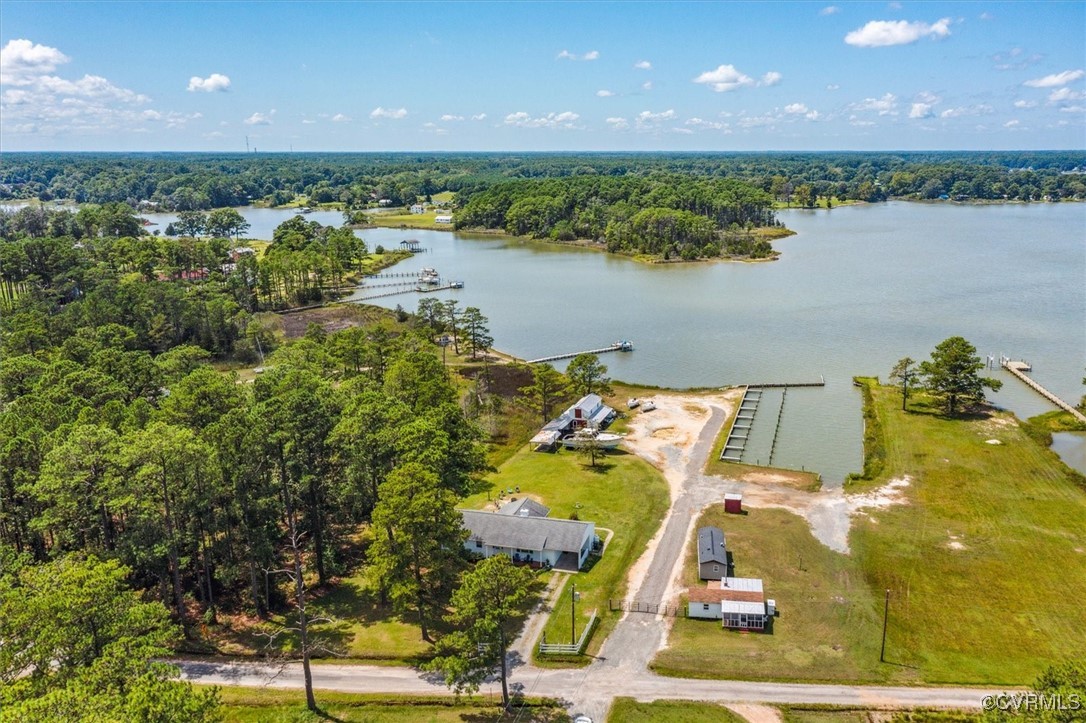 967 Lillys Neck Road Moon, VA 23119 - Photo 41 of 46 an aerial view of a house with a lake view