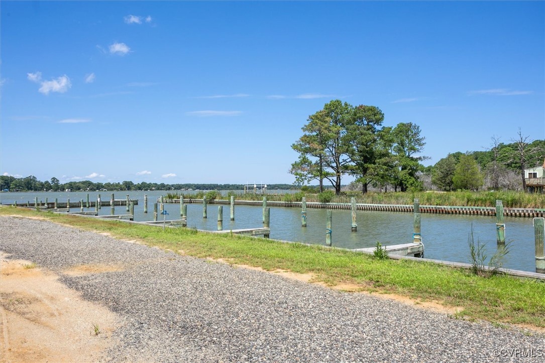 967 Lillys Neck Road Moon, VA 23119 - Photo 5 of 46 a view of a lake with a big yard