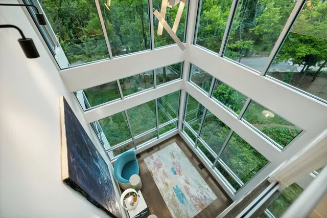a view of a kitchen counter top space and stainless steel appliances