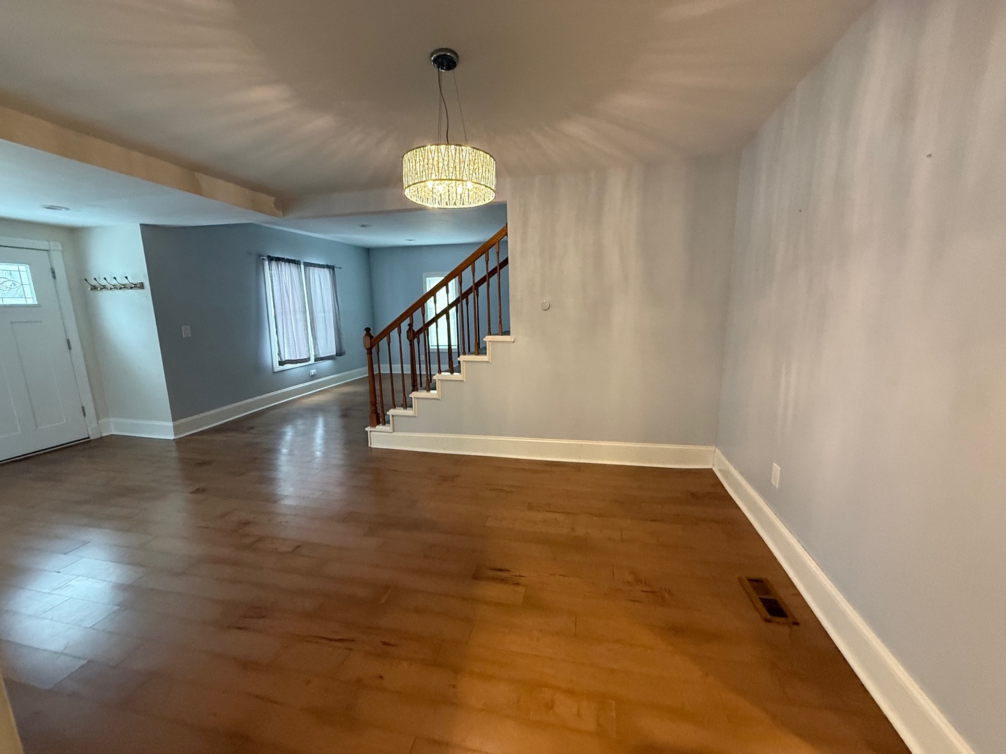 15036 West Russell Road Zion, IL 60099 - Photo 2 of 13 a view of entryway and hall with wooden floor