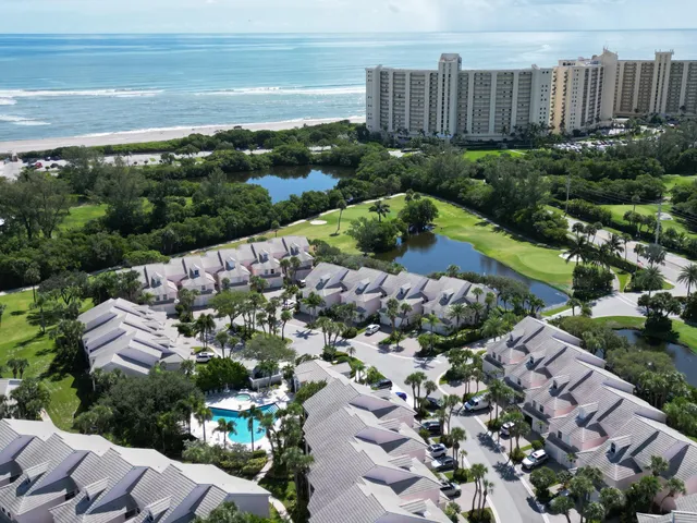 a view of a lake with a yard