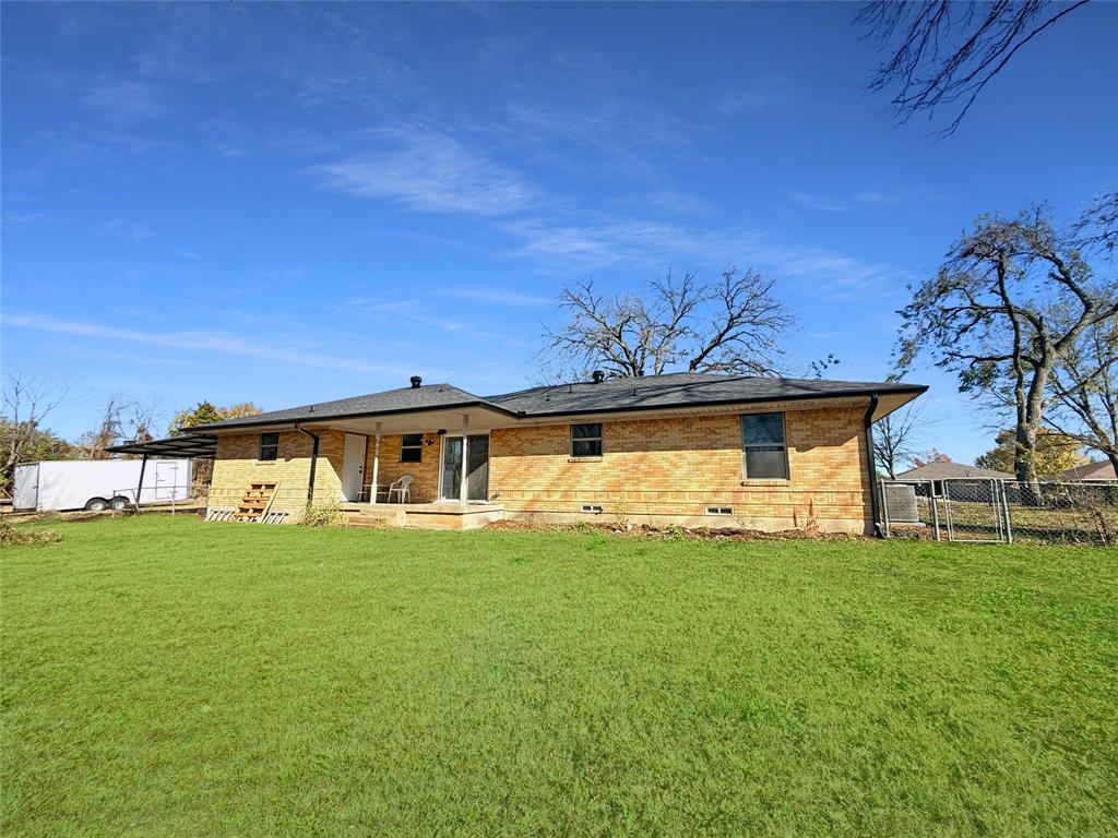 425 Chesier Road Lancaster, TX 75146 - Photo 15 of 15 a view of a yard in front of a house with a big yard