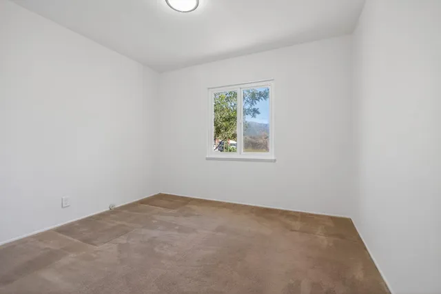 an empty room with a window