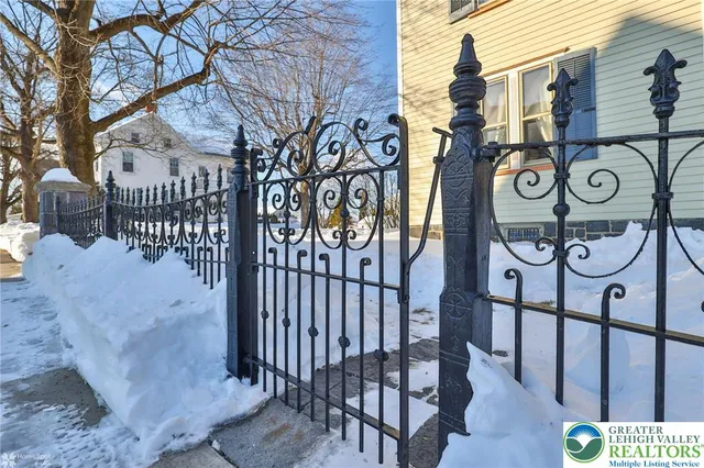 a view of a livingroom with furniture and hardwood floor