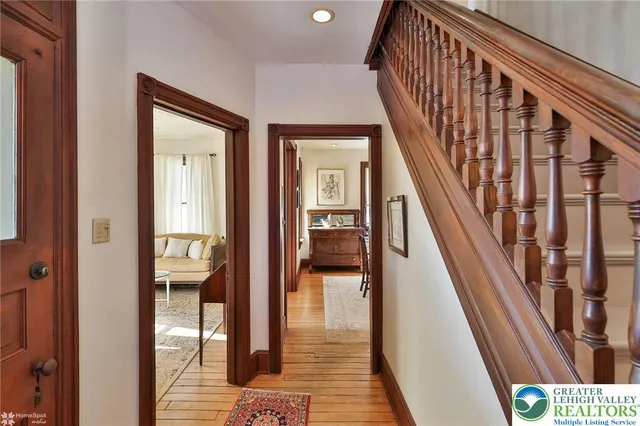 a view of a livingroom with furniture and entryway