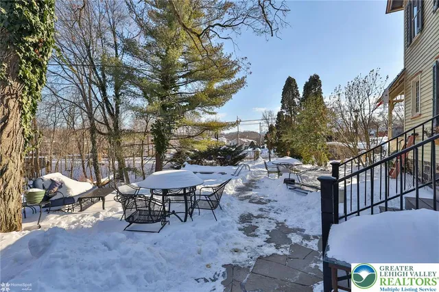 a view of a patio with swimming pool