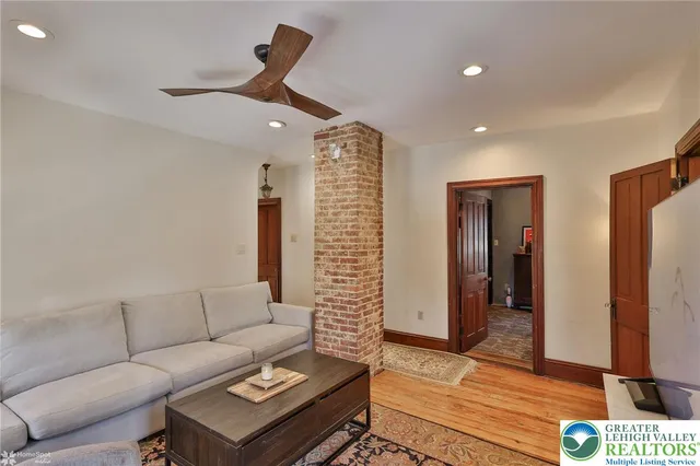 a view of an entryway with a floor to ceiling window