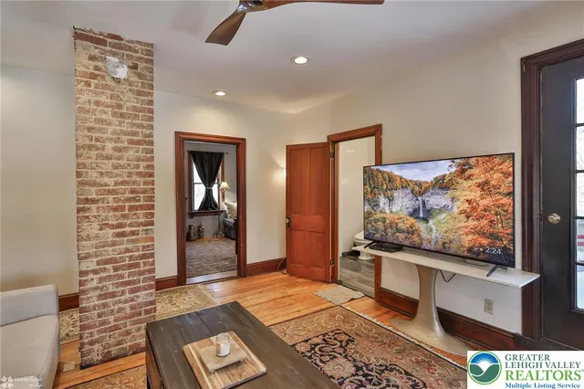 a view of a tree with a yard