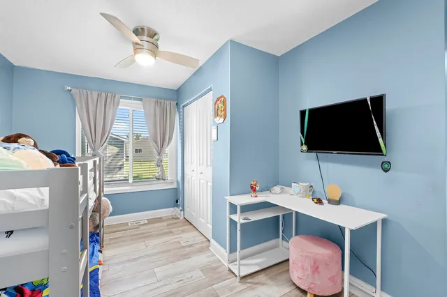 a very nice looking room with a big bed and a flat screen tv