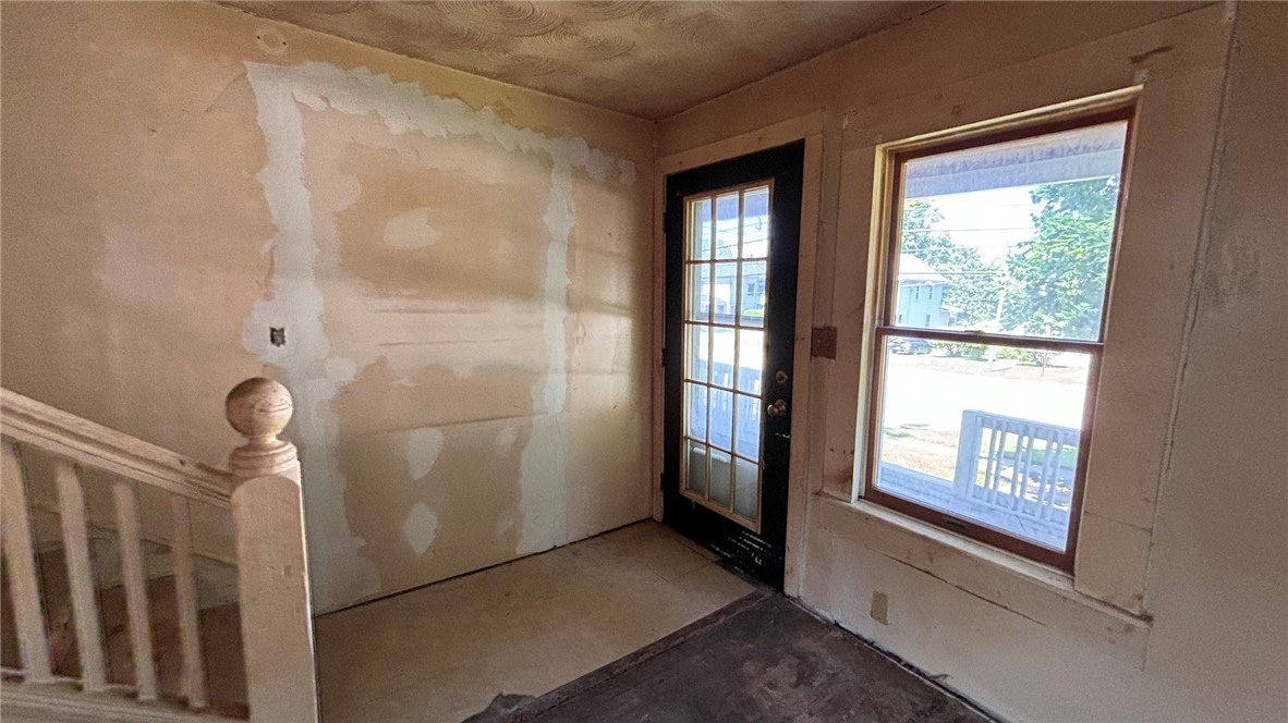 73 West Main Street Le Roy, NY 14482 - Photo 12 of 32 Foyer. Wall could be opened into Living Room
