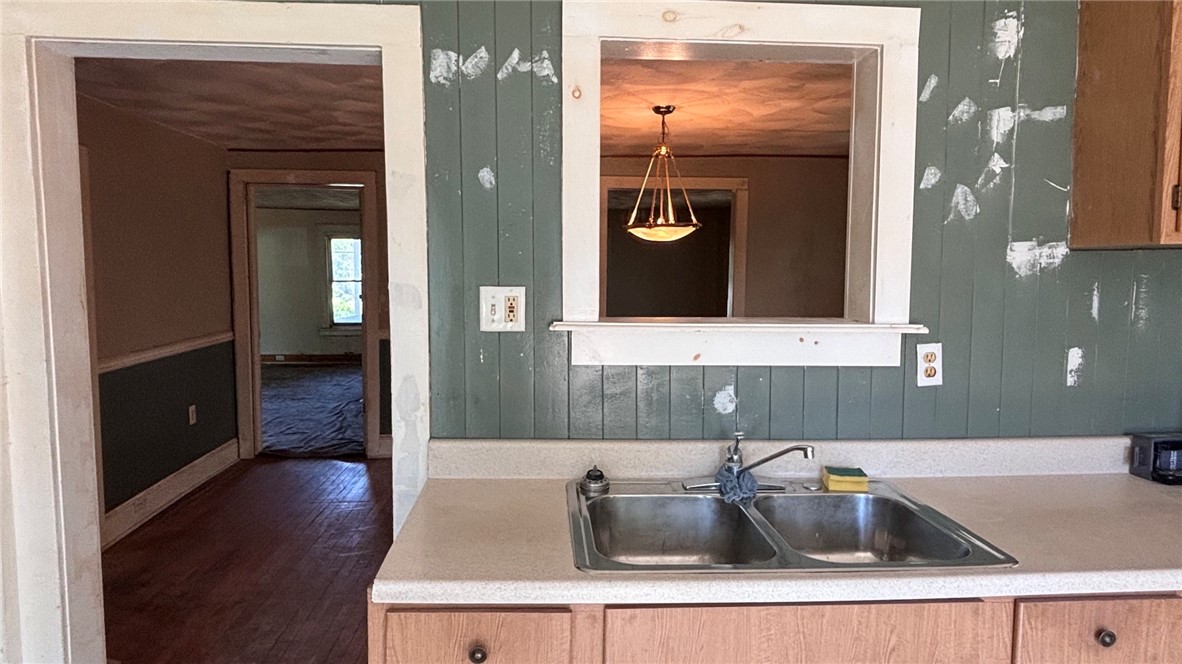 73 West Main Street Le Roy, NY 14482 - Photo 14 of 32 Sink and pass through to Dining Room