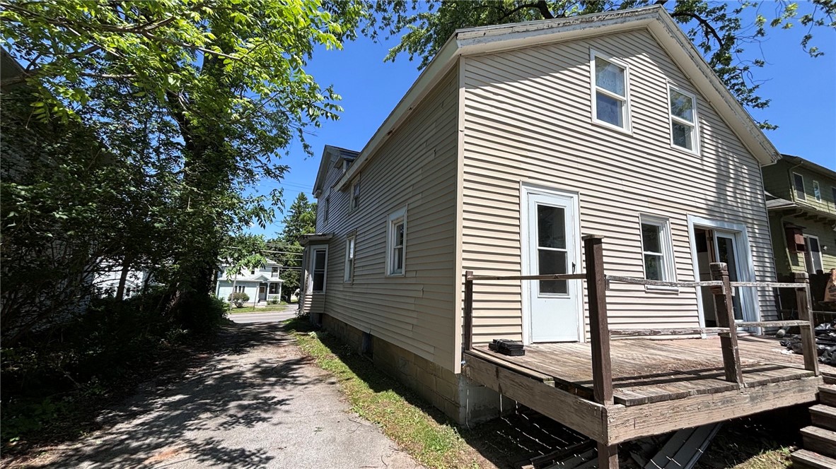 73 West Main Street Le Roy, NY 14482 - Photo 3 of 32 Rear of house with Deck