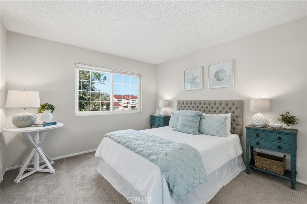3101 Plaza Del Amo, Unit 8 Torrance, CA 90503 - Photo 19 of 31 a bedroom with a bed and a window