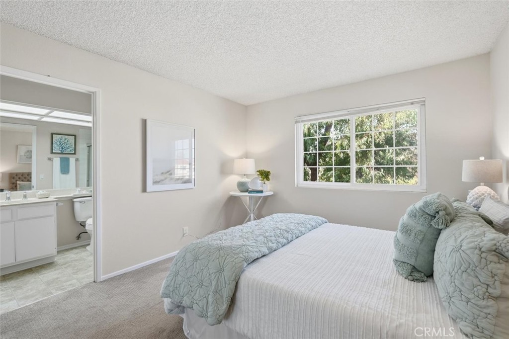 3101 Plaza Del Amo, Unit 8 Torrance, CA 90503 - Photo 20 of 31 a bedroom with a bed and a window
