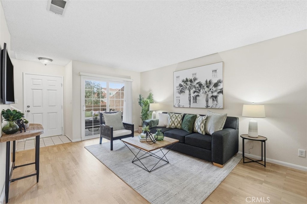 3101 Plaza Del Amo, Unit 8 Torrance, CA 90503 - Photo 5 of 31 a living room with furniture potted plant and a window
